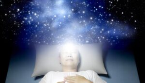 dreaming with arms raised